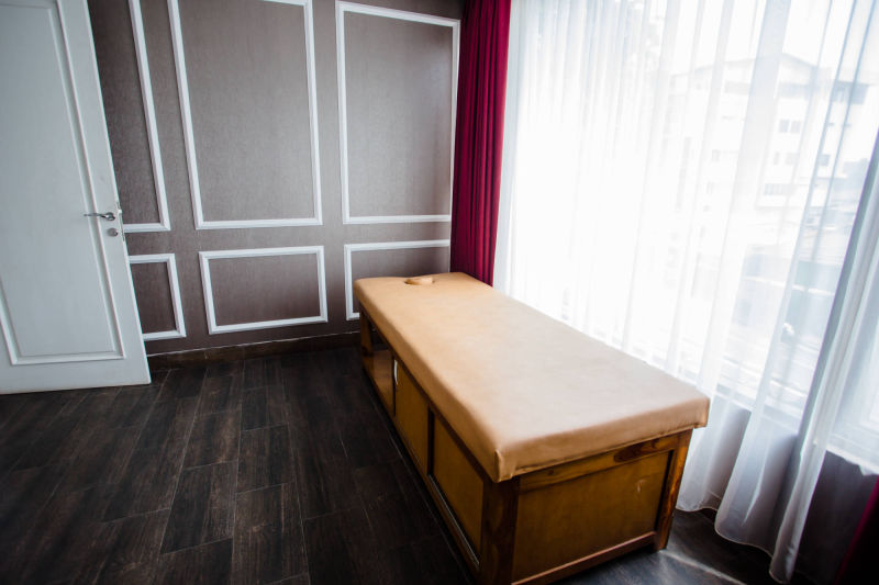 Massage room with bed